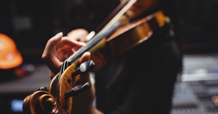 female student playing violin