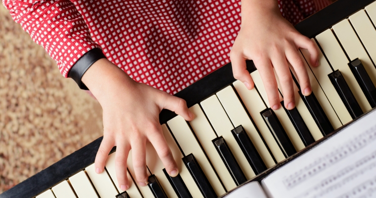 little girl learning play piano home 1920